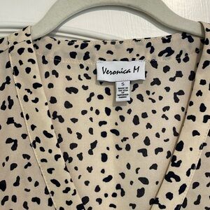 Animal print, long sleeve V-neck blouse